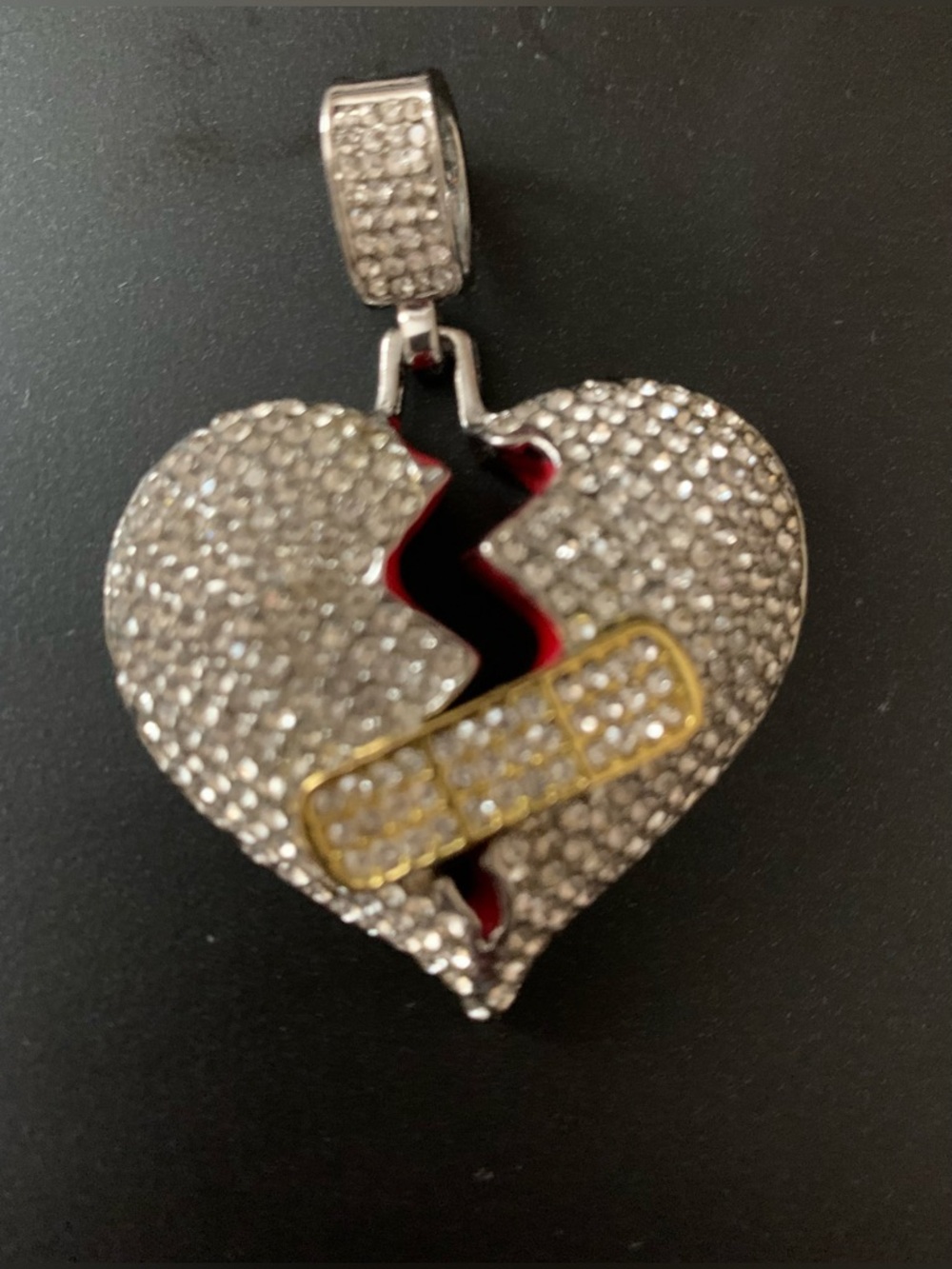Unisex-Simmering Broken Heart Pendant with Red Accent